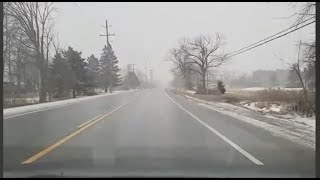 ASMER driving on a bumpy road through countryside , Ontario South