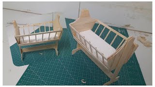 Membuat kerajinan miniatur Tempat Tidur Bayi dari stik es krim.