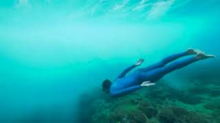 Below   Arnaud Jerald bodysurfing under Tahiti waves