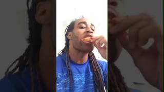 Stephon Gilmore eating chicken wings