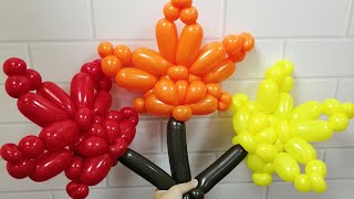 Кленовый лист из воздушных шаров Maple leaf from balloons Hoja de arce de globos