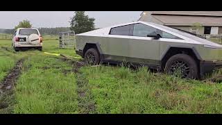 Tesla Cyber truck stuck in Florida after heavy rain. Had to be pulled out by a Toyota Landcruiser.