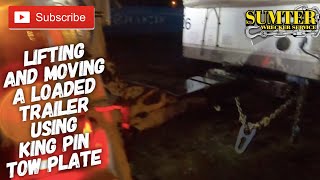 Lifting and moving a loaded trailer using King Pin Tow Plate