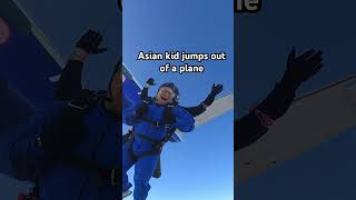 Asian kid jumps out of a plane