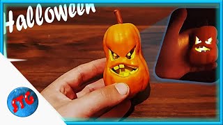 Sculpting tiny Jack O'Lantern from clay