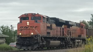 BNSF coal train with a LOUD  Horn and with a DPU in Superior Wisconsin.