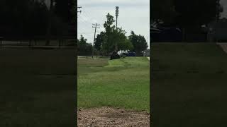 The Man Mows The Grass At Next To School