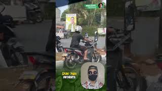 pria ini memodifikasi spion pada motornya dengan ukuran yang sangat besar