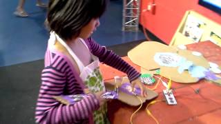 Girl jamming on MaKey MaKey guitar