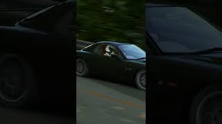 rx-7 and Skyline R-34 cruising down mountain road