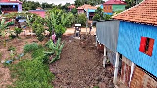 New the Project is actively working Bulldozer push soil In the corner of the house &5Ton dump truck