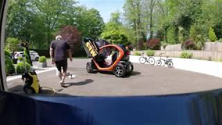 Cleaning a Renault Twizy on a very sunny day in May 2020