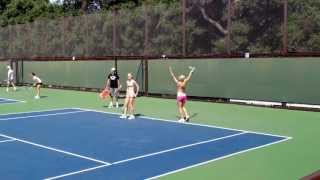 Radwanska sisters practicing serves