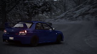 Subaru snow drifting in the mountains