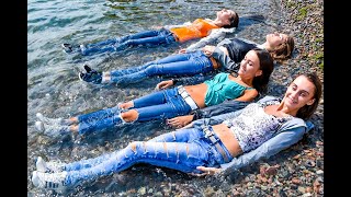 four beautiful girls in wet clothes