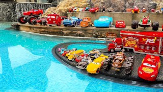 Disney Pixar Cars falling into deep pool, Lightning McQueen, Tow Mater, Mack, Sally, Francesco