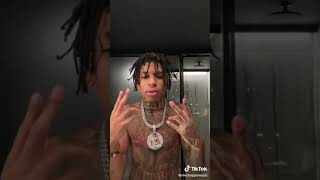 NLE Choppa throw gang signs