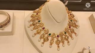 Malabar gold and diamond// necklace long haram latest designs earings