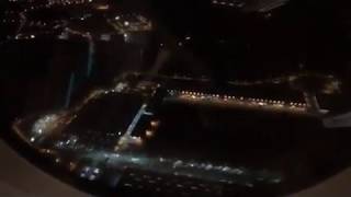 Plane taking off from Paris at night