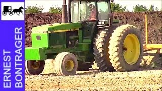 CAT and John Deere Moving Topsoil