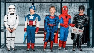 Superheroes at the Bus Stop: Spiderman, Batman, Superman and Captain America