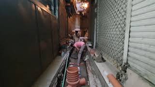 Infrastructure Works ( Water works) being done in the narrow streets of walled city Lahore