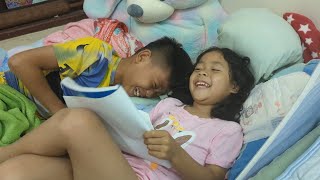 funny teaching her beloved brother reading Khmer lessons