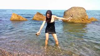 wetlook girl swimming in the sea