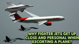 why fighter jets get up close and personal when escorting a plane?