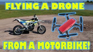 HOW TO FLY A DRONE FROM A MOTORBIKE!! | HUSQVARNA 701 SUPERMOTO & DJI SPARK