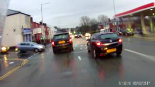 SG08 VMP pulls out on a biker on a wet roundabout