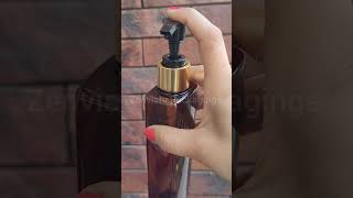 Zenvista Packaging  Cosmetic Amber Color Bottle With Gold Plated Dispenser Pump - [ZMA04]