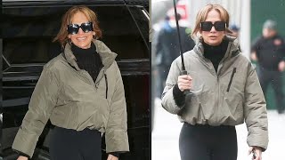 Jennifer Lopez braves the rain while heading to a gym in New York City