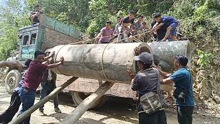 Hume Pipe unloading for maintaining Centennial Jubilee Road, Naghutomi Village