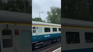 Class 47 848 passing Hinton admiral with a single tone and 44871 on the back