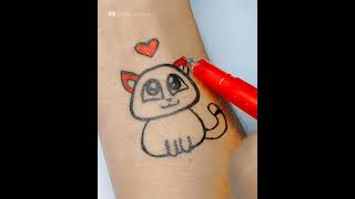 Cute Kitten Tattoo With Pen