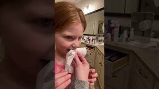 Tooth Fairy Alert: Witness Haven's Courage as Mommy Pulls Out Her Front Tooth!