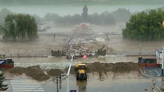 China river overflow submerges city as flooding worsens across multiple provinces