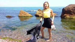 girl in a women's suit and shoes gets wet