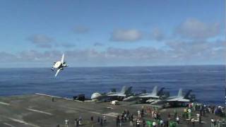 E2C Hawkeye 2000 doing ultra low pass on the USS Ronald Reagan