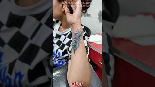 Peacock Feather fixup tattoo on wrist. #PeacockFeatherTattoo #TattooFixUp #WristTattoo #TattooRevamp