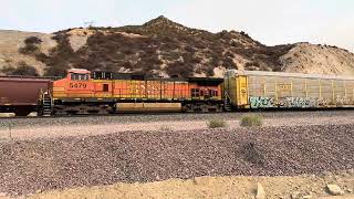 BNSF 7666 Eastbound Manifest Meets BNSF 5479 Westbound Autorack Train Passing Through Blue Cut CA