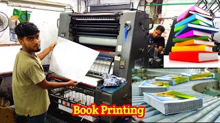 Book printing by Heidelberg offset printing machine. 4 colors printing.