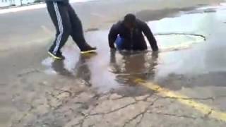 Man jumps in puddle and ends up in massive hole of water