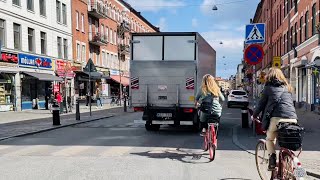 Cycling Sweden: Malmö city with friends. Sunny bike ride through busy central areas.