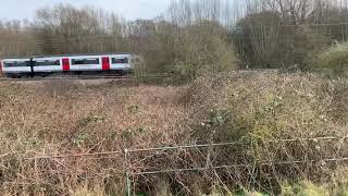 Class 317 passing near Cranbourne LC