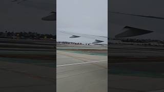 LAX 777-300 taking off