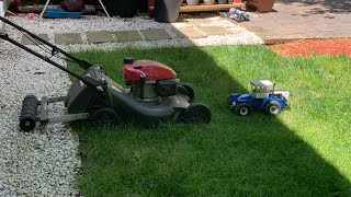 Amazing 3D Printed tractor pulls lawn mower with striping kit.   Norstates AT01