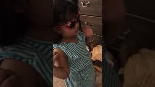 Baby talking wearing sunglasses, Manha Muskaan Mahmood (personal/home video) 1747