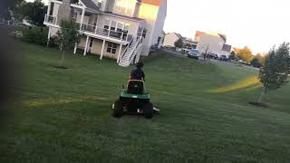 Me driving a lawnmower